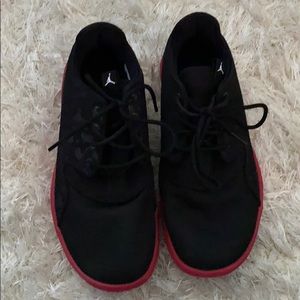 RED AND BLACK JORDANS